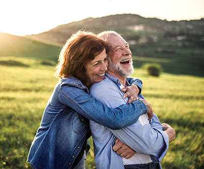 smiling senior couple hugging tax free retirement columbus oh